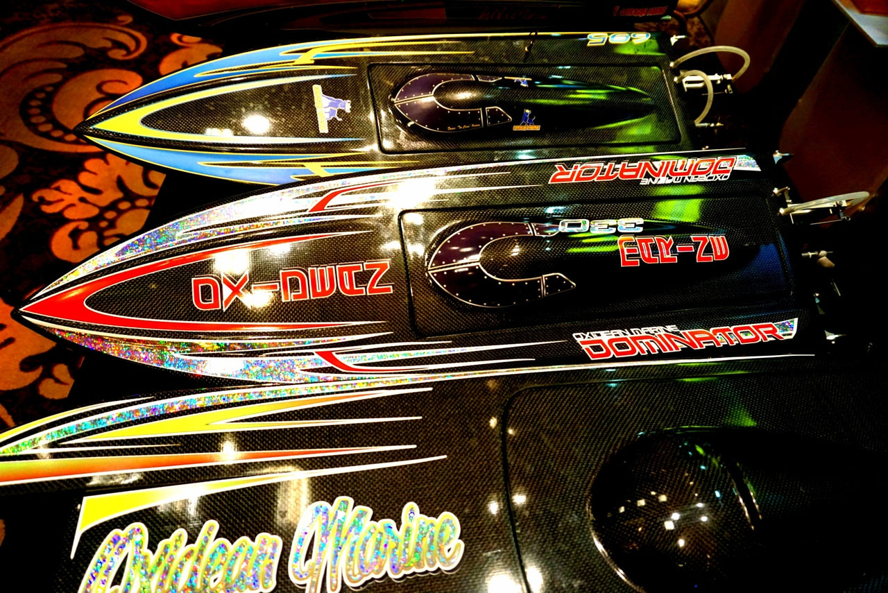 Three RC Boats with graphics